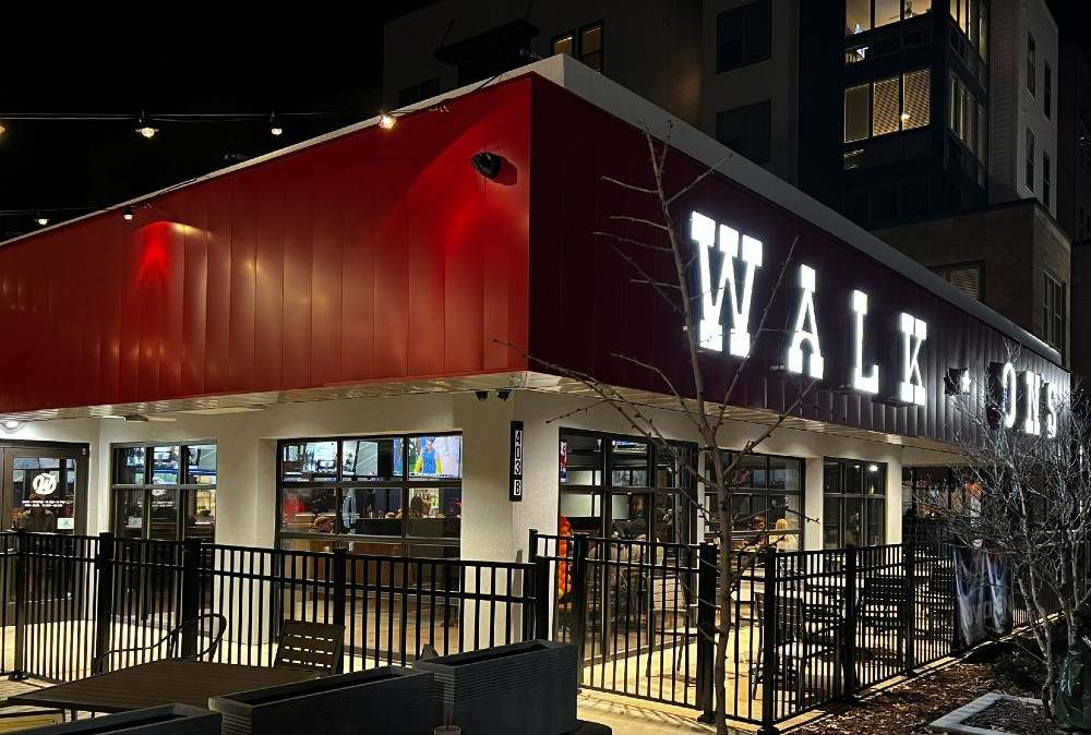 Walk-On's Sports Bistreaux, and neighbor The Junkyard, are the first businesses to operate at the site since the Astro III movie theater closes about 15 years ago. (Photo/Ross Norton)
