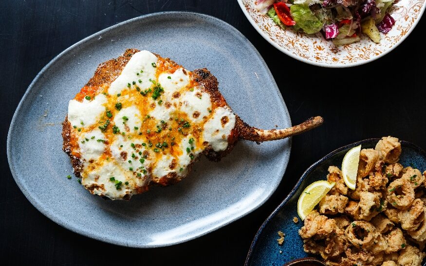DeMarco's diners can choose from among a half dozen signature pies like the Soppressata and Honey, the Pistachio Mortadella and the Vodka Supreme made with DeMarco’s vodka sauce, house made mozzarella, sausage and Parmigiano Reggiano, as well as the Chop Italian, pictured here. (Photo/DeMarco's)