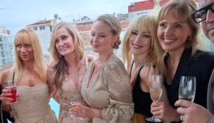 Karen Floyd, second from left, celebrates her award and the debut of a trailer for her newest film during the 78th Cannes Film Festival. (Photo/ELYSIAN)
