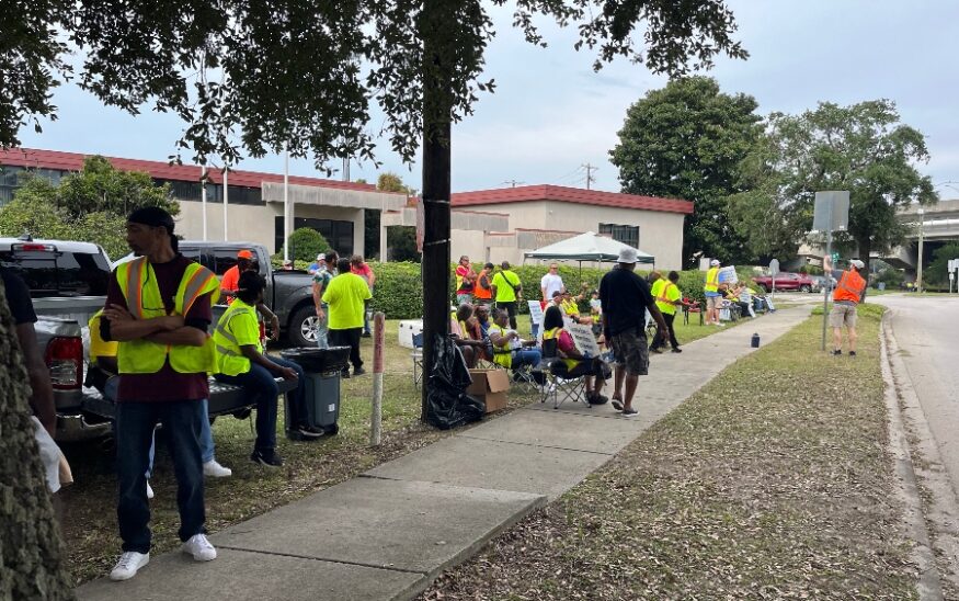 Members of the International Longshoremen's Association march in a strike outside thier headquarters in Charleston. (Photo/Hollie Moore)