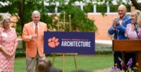 Former Clemson University President and architecture professor Jim Barker and Marcia Barker, along with current President Jim Clements and Beth Clements unveil the new name of the Richard A. McMahan School of Architecture. (Photo/Clemson University)