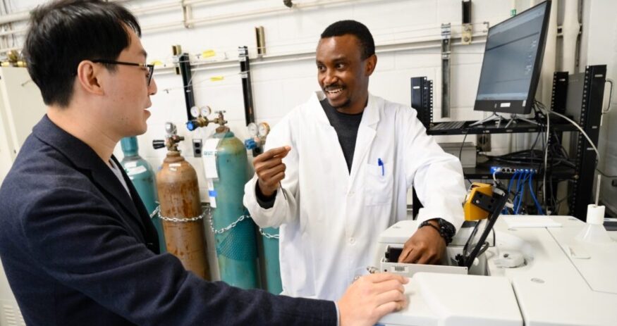 Alexander Adogwa (right) works with Ming Yang in an Earle Hall lab at Clemson University. (Photo/Clemson University)