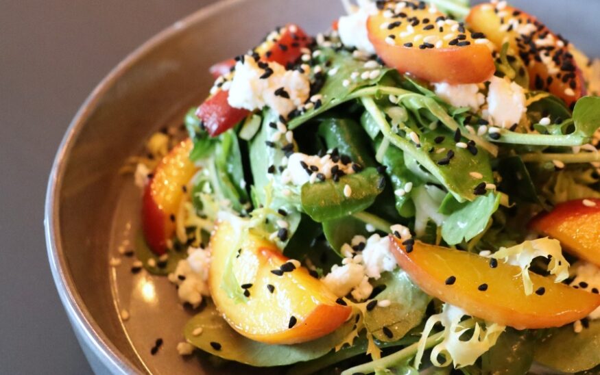 Black Sheep, a new fine-dining restaurant in Greenville, will feature global cuisine inspired by Armenia, Syria, Turkey and Lebanon, including a peach salad. (Photo/Black Sheep)|The 5,000-square-foot Black Sheep replaces the former Two Chefs in the North Main neighborhood. (Photo/Black Sheep)|Danielle Grigorian relocated to Greenville eight years ago and most recently served as chef de cuisine at Jianna. (Photo/Black Sheep)