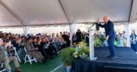 Joe Erwin, chairman and owner of Greenville Triumph SC and Greenville Liberty SC, addressed an enthusiastic crowd during the March groundbreaking ceremony in Mauldin. Attendees included Ronaldo de Assis Moreira — Ronaldinho — sitting on the front row, far left in the center section. (Photo/Sarah Marko)