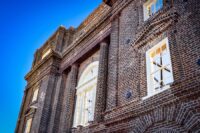 The restored and stabilized Bennett Rice Mill façade stands at the center of Union Pier. (Photo/English Hurteau)
