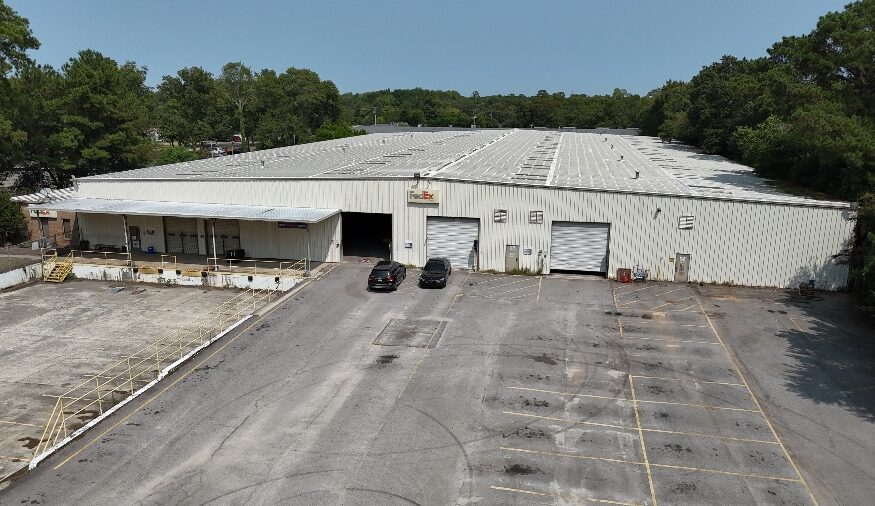 Chuck Salley, Thomas Beard and John Peebles, of Colliers South Carolina brokered the lease of an approximately 62,812-square-foot warehouse at 150 Queen Parkway in West Columbia to Stroud Supply. (Photo/Colliers South Carolina)