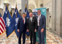 Pictured (left to right): William “Bill” Kirkland, SCRA interim president and CEO, Governor Henry McMaster, Brian Shea, co-founder and principal at Simon Everett, Ltd. (Photo/South Carolina Research Authority)