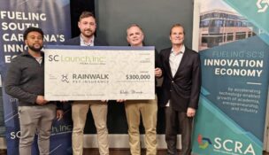 Pictured (left to right) are Javon Jones, SCRA senior investment associate; Joshua Snead, Rainwalk Technology CEO; Mitch Smith, SCRA senior investment manager; Lee MacIlwinen, SCRA chief program officer. (Photo/SCRA)
