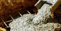Concrete is poured into a form during a construction project, reflecting the type of ready-mix operations Coastal Ready Mix plans to bring to Horry County. (Photo/DepositPhotos)