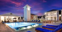 A rendering shows the pool and clubhouse planned for The Cottage Green in Mauldin, a key amenity in HMF Americana’s upcoming single-family rental community. (Rendering/HMF Americana)