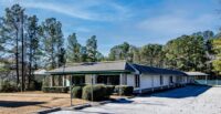rinity Partners’ Bruce Harper and Robbie Cook represented SCGA while Nick Stomski, Jake Nidiffer and Ryan Causey represented the seller. (Photo/Trinity Partners)