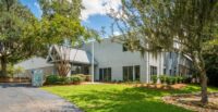 RCB Development’s redeveloped industrial facility on Coosaw Creek Boulevard in North Charleston is now fully leased to two growing companies. (Photo/Keen Eye Marketing)