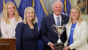 Boeing’s 787 Dreamliner, assembled in North Charleston, was named the 2026 Coolest Thing Made in South Carolina after a global vote. Pictured are Stephanie DeFreese from Blue Cross Blue Shield of South Carolina. SCMC’s Sara Hazzard, Gov. Henry McMaster and Boeing's Jessica Williford. (Photo/SCMC)