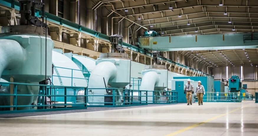 Duke Energy workers walk through the turbine room at Oconee Nuclear Station near Seneca. Environmental groups and Duke Energy reached a settlement tied to the utility’s proposal to merge its Carolinas and Progress subsidiaries. (Photo/Duke Energy)