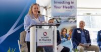 Dr. Megan Baker, senior vice president and chief clinical officer, addresses project supporters ahead of the groundbreaking ceremony. (Photo/Roper St. Francis)