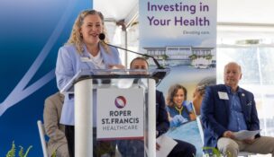 Dr. Megan Baker, senior vice president and chief clinical officer, addresses project supporters ahead of the groundbreaking ceremony. (Photo/Roper St. Francis)