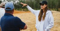 LPGA champion Michelle Wie West and architect Mike Koprowski survey their blank canvas — 25-acre piece of the Sandhills that will soon be the Sweet Tooth golf course. (Photo/Ryan Barnett)