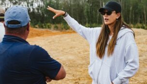 LPGA champion Michelle Wie West and architect Mike Koprowski survey their blank canvas — 25-acre piece of the Sandhills that will soon be the Sweet Tooth golf course. (Photo/Ryan Barnett)
