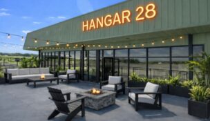 A rendering of Hangar 28 Kitchen & Events, which will bring a full-service restaurant, bar and event venue to Greenville Downtown Airport this summer. (Image/Hanger 28 Kitchen & Events)