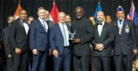 Lionel "T.K." Kennedy, CEO of Midlands STEM Charter School, accepts the inaugural Valor in Education Award from the Charter Institute at Erskine in recognition of his military service and dedication to education. (Photo/Midlands STEM Charter School)