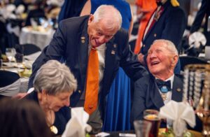 Medal of Honor recipient U.S. Marine Corps Maj. Gen. James E. Livingston and his wife share a laugh with retired U.S. Air Force Col. Sandy Edge during the inaugural South Carolina Military Veterans Hall of Fame induction ceremony at Fort Jackson on June 6. (Photo/Ken Scar)