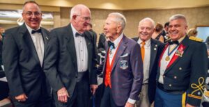 Air Force Col. Keith Balts (retired), director of the Leadership Signature Program in the Wilbur O. and Ann Powers College of Business; retired Air Force Brig. Gen. Hap Carr, a member of the SCMVHOF board of directors and inaugural inductee; retired Marine Corps Maj. Gen. and Medal of Honor recipient James Everett Livingston; retired Air Force Col. Sandy Edge; and retired Army Lt. Col. Jimmy Mullinax, Clemson’s executive director of military affairs. (Photo/Ken Scar)