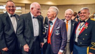 Air Force Col. Keith Balts (retired), director of the Leadership Signature Program in the Wilbur O. and Ann Powers College of Business; retired Air Force Brig. Gen. Hap Carr, a member of the SCMVHOF board of directors and inaugural inductee; retired Marine Corps Maj. Gen. and Medal of Honor recipient James Everett Livingston; retired Air Force Col. Sandy Edge; and retired Army Lt. Col. Jimmy Mullinax, Clemson’s executive director of military affairs. (Photo/Ken Scar)