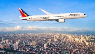 A Boeing 787-9 Dreamliner flies above Manila. Philippine Airlines has committed to growing its fleet of North Charleston-made jets. (Photo/Boeing)