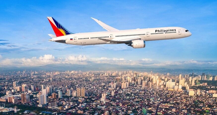 A Boeing 787-9 Dreamliner flies above Manila. Philippine Airlines has committed to growing its fleet of North Charleston-made jets. (Photo/Boeing)