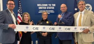 Frank Murray, vice president of Planning & Engineering at CAE; Elizabeth Taylor, chair of CAE Commission; Veronica Rubio (acting area port director for CBP Charleston; Chris White, president and CEO of CAE; and Mark Weber, CAE commissioner, dedicate the new Customs & Border Protection Facility. (Photo/www.FlyCAE.com)