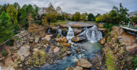 Auro Hotels and Marriott executives joined Greenville leaders to announce plans to transform the historic Bowater Building into South Carolina's first JW Marriott hotel, a centerpiece of the Falls Park Conference District. (Photo/DepositPhotos)