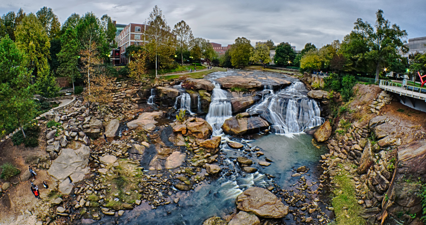 Auro Hotels and Marriott executives joined Greenville leaders to announce plans to transform the historic Bowater Building into South Carolina's first JW Marriott hotel, a centerpiece of the Falls Park Conference District. (Photo/DepositPhotos)