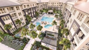 The pool at Hutchinson Apartments is surrounded by residential buildings and amenities within the 324-unit community in Nexton. (Rendering/Middleburg Communities)